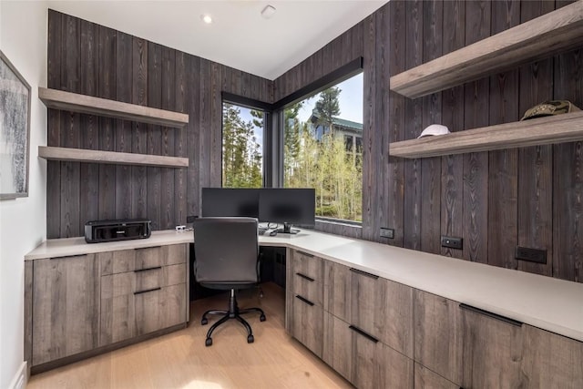 214 Windflower Ln, Frisco, CO 80443 - office with built in desk, light wood-style floors, and wood walls