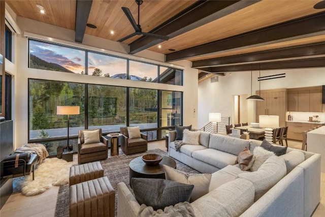 214 Windflower Ln, Frisco, CO 80443 - living area with beam ceiling, a ceiling fan, wood finished floors, and recessed lighting