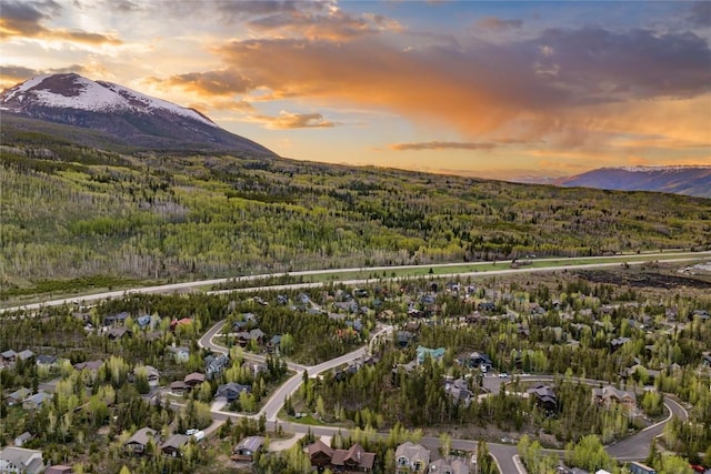 214 Windflower Ln, Frisco, CO 80443 - aerial view at dusk of a mountain view and a view of trees