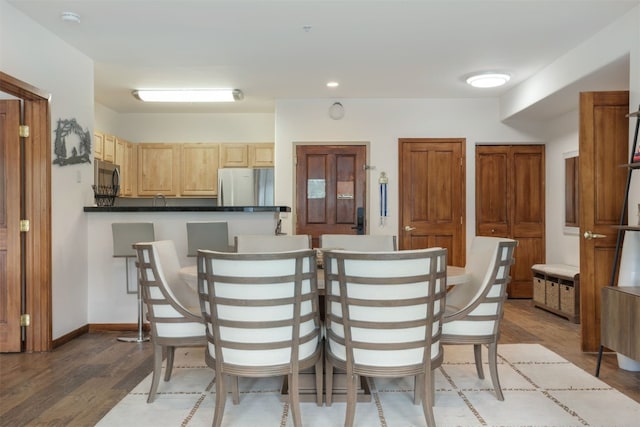 23110 US Highway 6 Unit 5074, Keystone, CO 80435 - dining space with wood finished floors, recessed lighting, and baseboards