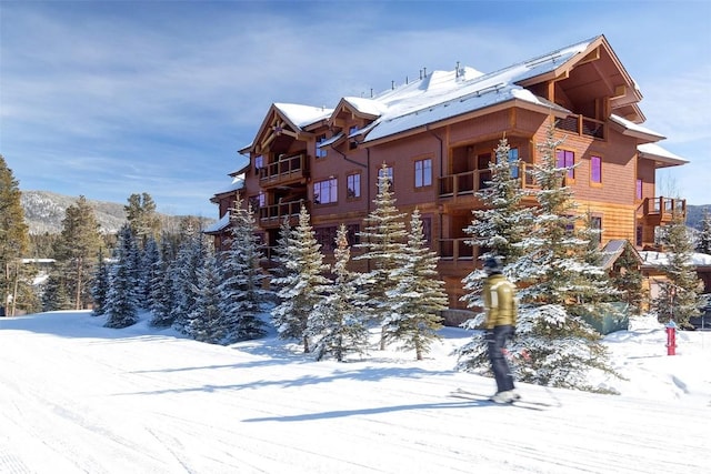 view of snow covered property