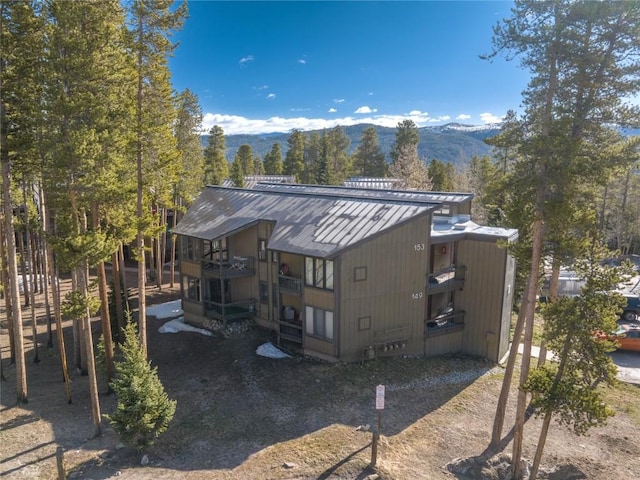 1179 Ski Hill Rd Unit 147, Breckenridge, CO 80424 - exterior space featuring a standing seam roof, metal roof, and a mountain view