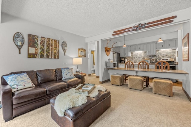 1179 Ski Hill Rd Unit 147, Breckenridge, CO 80424 - living area with a textured ceiling and light carpet
