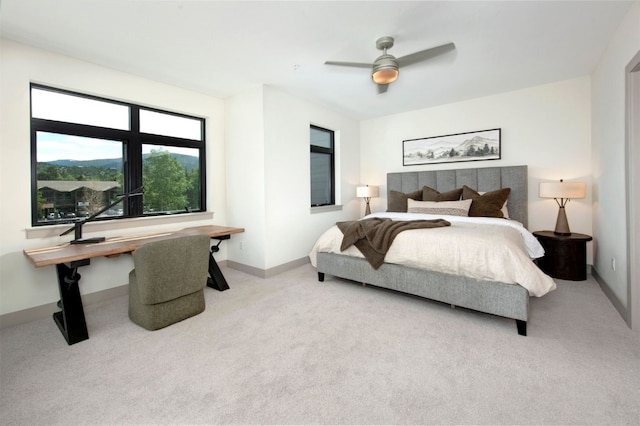 37 W 4th St Unit 201E, Silverthorne, CO 80498 - carpeted bedroom with baseboards and ceiling fan