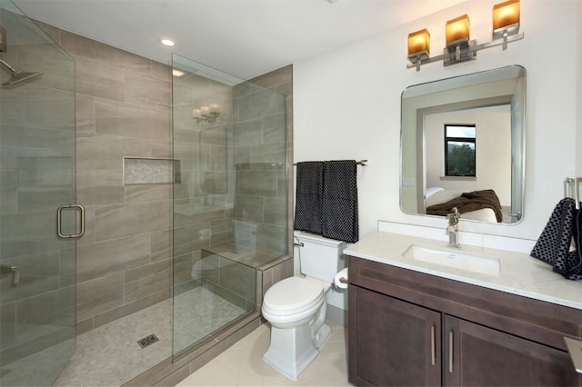 37 W 4th St Unit 201E, Silverthorne, CO 80498 - ensuite bathroom featuring vanity, a stall shower, tile patterned floors, and recessed lighting