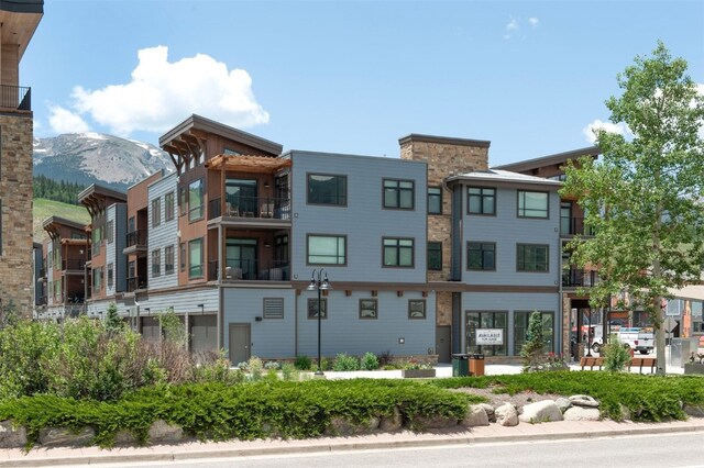 37 W 4th St Unit 201E, Silverthorne, CO 80498 - view of building exterior with a mountain view