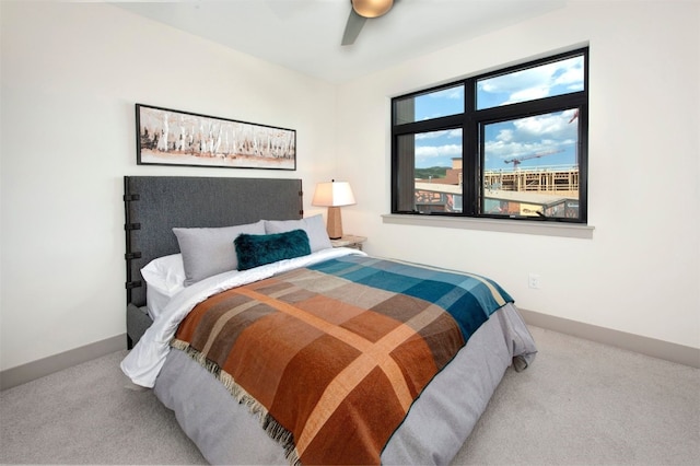 37 W 4th St Unit 201E, Silverthorne, CO 80498 - carpeted bedroom featuring baseboards and a ceiling fan