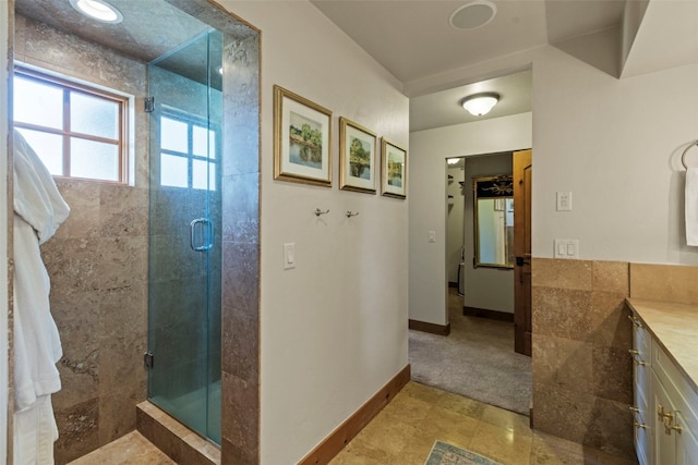 34 Snow Peak Ct, Dillon, CO 80435 - bathroom featuring vanity, a stall shower, and baseboards