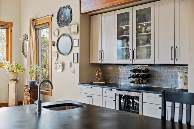 34 Snow Peak Ct, Dillon, CO 80435 - indoor dry bar with beverage cooler and tasteful backsplash