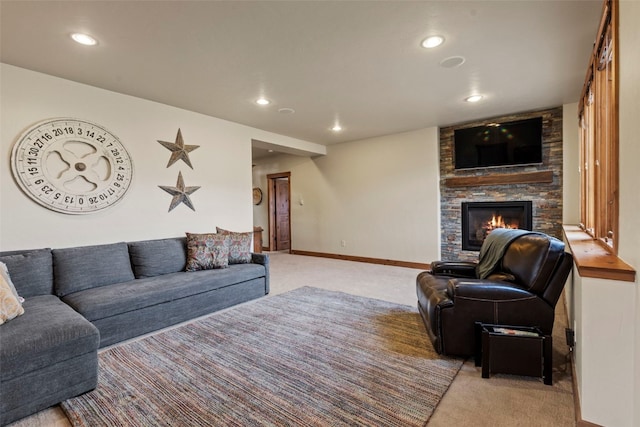34 Snow Peak Ct, Dillon, CO 80435 - living room with light carpet, a stone fireplace, recessed lighting, and baseboards