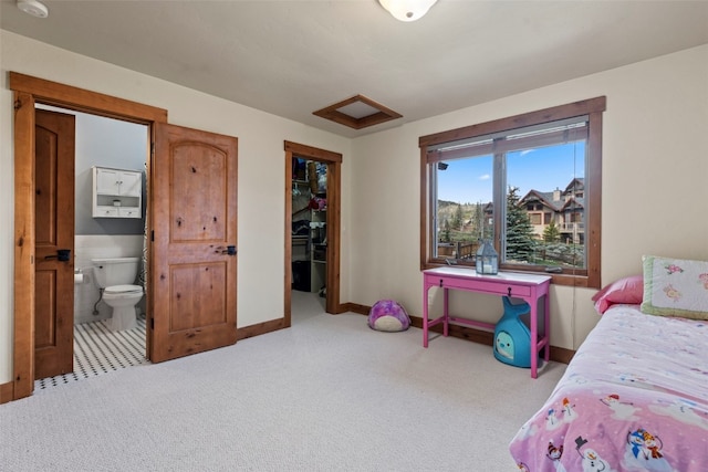 34 Snow Peak Ct, Dillon, CO 80435 - bedroom with attic access, a walk in closet, carpet, baseboards, and a closet