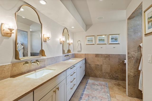 34 Snow Peak Ct, Dillon, CO 80435 - full bathroom with double vanity, recessed lighting, and tile walls