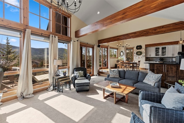 34 Snow Peak Ct, Dillon, CO 80435 - carpeted living area featuring a chandelier, a mountain view, and recessed lighting
