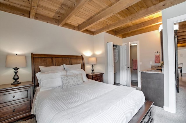 8500 Ryan Gulch Rd Unit G3, Silverthorne, CO 80498 - carpeted bedroom featuring wood ceiling with exposed beams