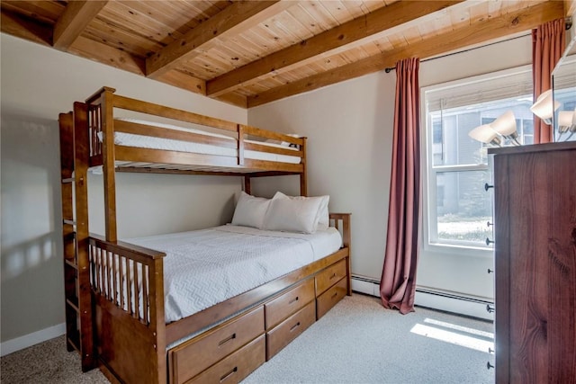 8500 Ryan Gulch Rd Unit G3, Silverthorne, CO 80498 - carpeted bedroom featuring wood ceiling with exposed beams and a baseboard heating unit