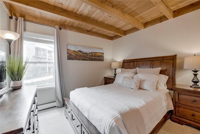 8500 Ryan Gulch Rd Unit G3, Silverthorne, CO 80498 - bedroom featuring wood ceiling with exposed beams, a baseboard heating unit, and light colored carpet