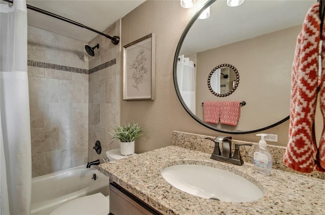 8500 Ryan Gulch Rd Unit G3, Silverthorne, CO 80498 - full bathroom with shower / bath combo, vanity, toilet, and a textured wall