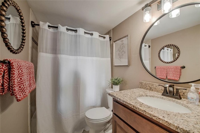 8500 Ryan Gulch Rd Unit G3, Silverthorne, CO 80498 - bathroom featuring vanity, toilet, and a shower with shower curtain