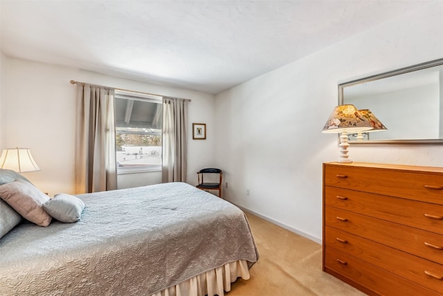 bedroom with light carpet