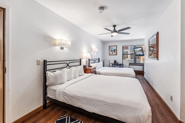 100 S Park Ave Unit E111, 112, Breckenridge, CO 80424 - bedroom with dark wood-style flooring, baseboards, and a ceiling fan