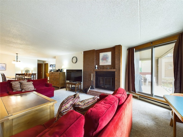 carpeted living room featuring a fireplace and a textured ceiling