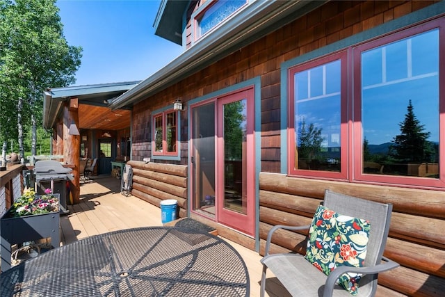 57610 Longfellow Way, Clark, CO 80428 - wooden deck with a grill