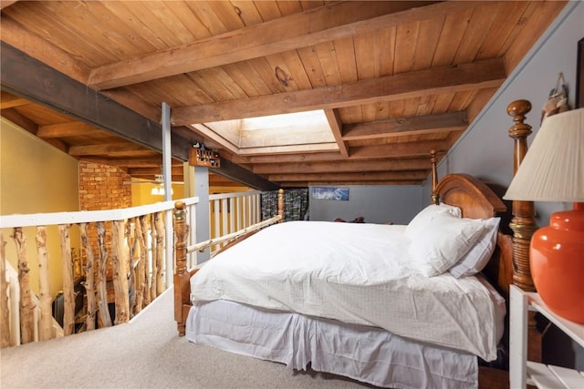 carpeted bedroom with beamed ceiling and wooden ceiling