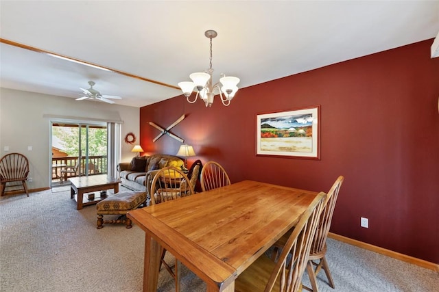 118 Lookout Ridge Dr Unit 118, Dillon, CO 80435 - carpeted dining space featuring a chandelier and a ceiling fan