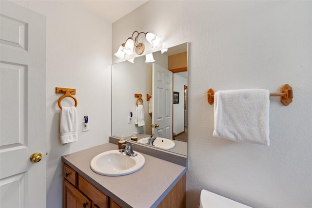 118 Lookout Ridge Dr Unit 118, Dillon, CO 80435 - half bath featuring vanity and toilet