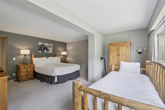 22097 Saints John Rd Unit 2537, Keystone, CO 80435 - bedroom with light colored carpet and baseboards