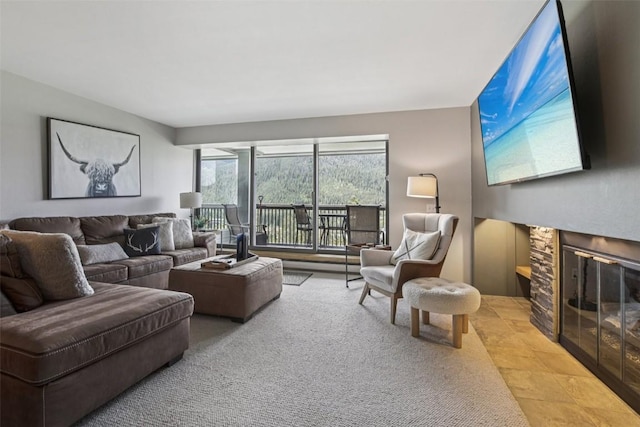 22097 Saints John Rd Unit 2537, Keystone, CO 80435 - living area with a stone fireplace