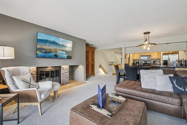 22097 Saints John Rd Unit 2537, Keystone, CO 80435 - living room with light colored carpet and a stone fireplace