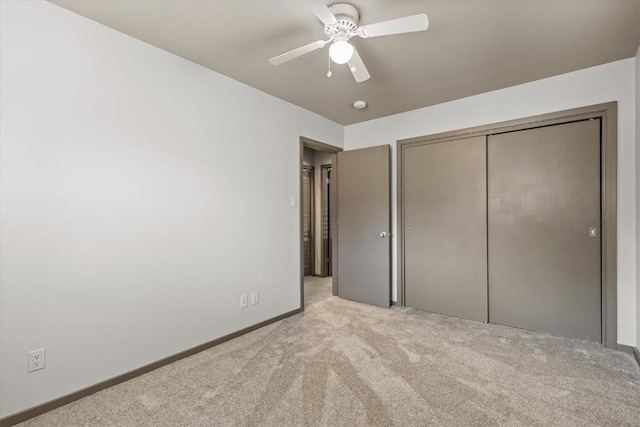 818 Broad St, Steamboat Springs, CO 80487 - unfurnished bedroom featuring carpet, a closet, baseboards, and ceiling fan