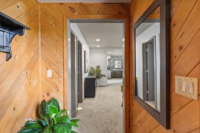 818 Broad St, Steamboat Springs, CO 80487 - hall featuring carpet flooring and wooden walls