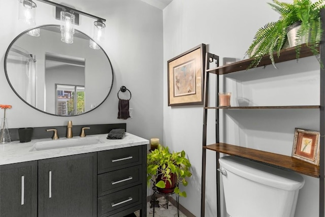 818 Broad St, Steamboat Springs, CO 80487 - bathroom featuring vanity and toilet
