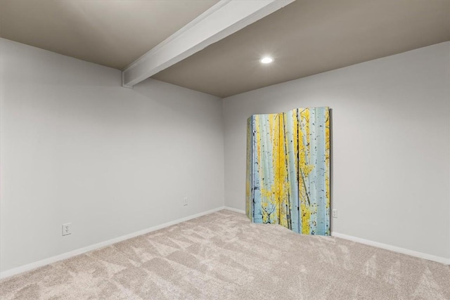 818 Broad St, Steamboat Springs, CO 80487 - carpeted empty room with beam ceiling, baseboards, and recessed lighting