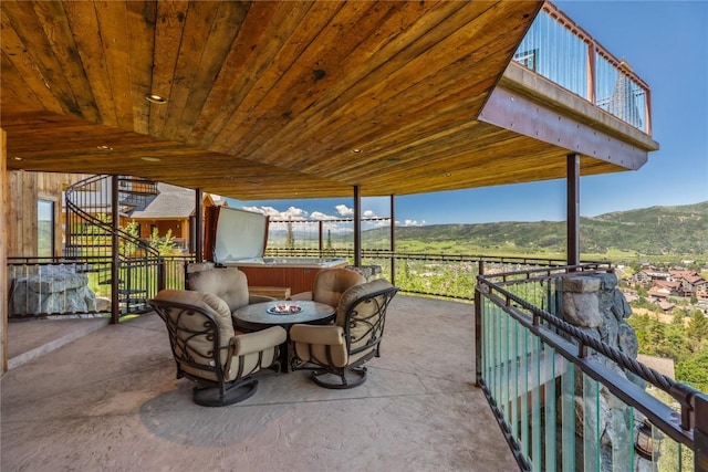 view of patio featuring a mountain view