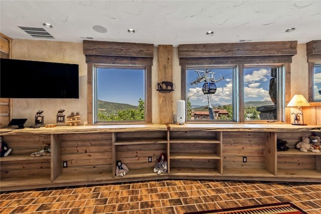 bar with recessed lighting and visible vents