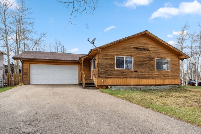 316 3rd St, Fairplay, CO 80440 - view of front of property with asphalt driveway and a garage