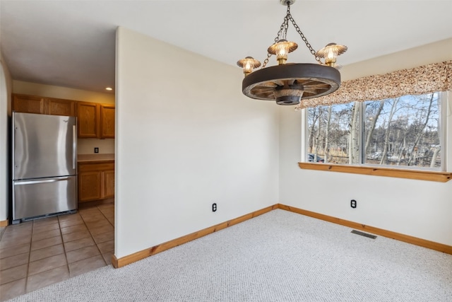 316 3rd St, Fairplay, CO 80440 - unfurnished dining area with a chandelier, baseboards, light colored carpet, and recessed lighting