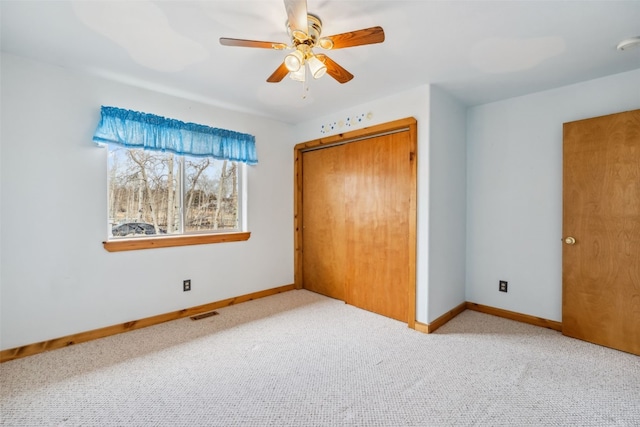 316 3rd St, Fairplay, CO 80440 - unfurnished bedroom with baseboards, carpet flooring, a closet, and ceiling fan