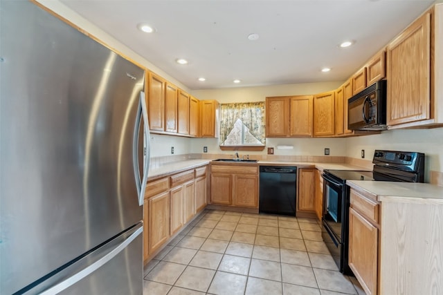 316 3rd St, Fairplay, CO 80440 - kitchen featuring black appliances, a sink, recessed lighting, light countertops, and light tile patterned floors