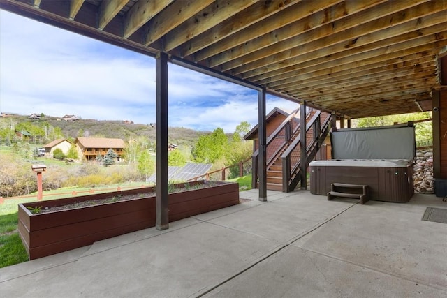 22755 Snowbird Trl, Oak Creek, CO 80467 - view of patio / terrace with a hot tub and stairway