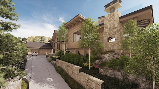 view of property exterior with stone siding