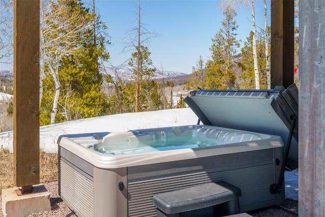 21185 County Road 16, Oak Creek, CO 80467 - exterior space with a hot tub and a mountain view