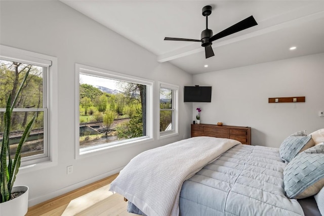 410 River Rd, Steamboat Springs, CO 80487 - bedroom with light wood-style flooring, ceiling fan, recessed lighting, vaulted ceiling, and baseboards