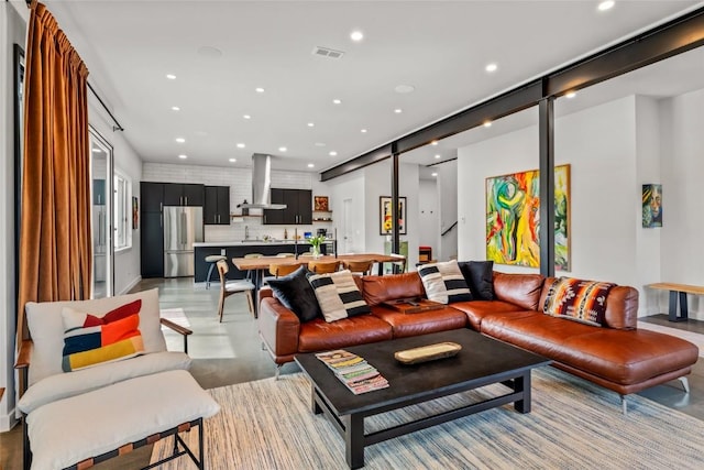 410 River Rd, Steamboat Springs, CO 80487 - living room with recessed lighting and concrete floors