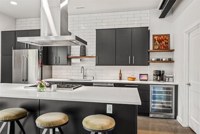 410 River Rd, Steamboat Springs, CO 80487 - kitchen featuring open shelves, wine cooler, wall chimney exhaust hood, and stainless steel appliances