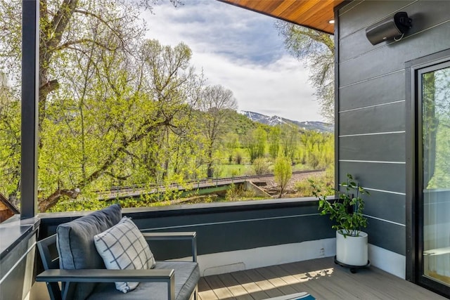 410 River Rd, Steamboat Springs, CO 80487 - wooden deck with a mountain view
