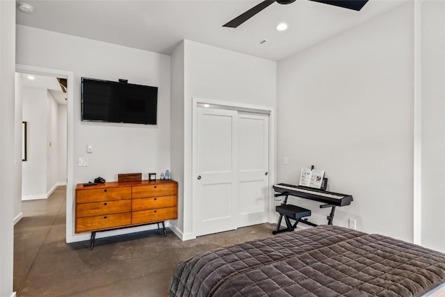 410 River Rd, Steamboat Springs, CO 80487 - bedroom with concrete floors, baseboards, recessed lighting, a closet, and ceiling fan
